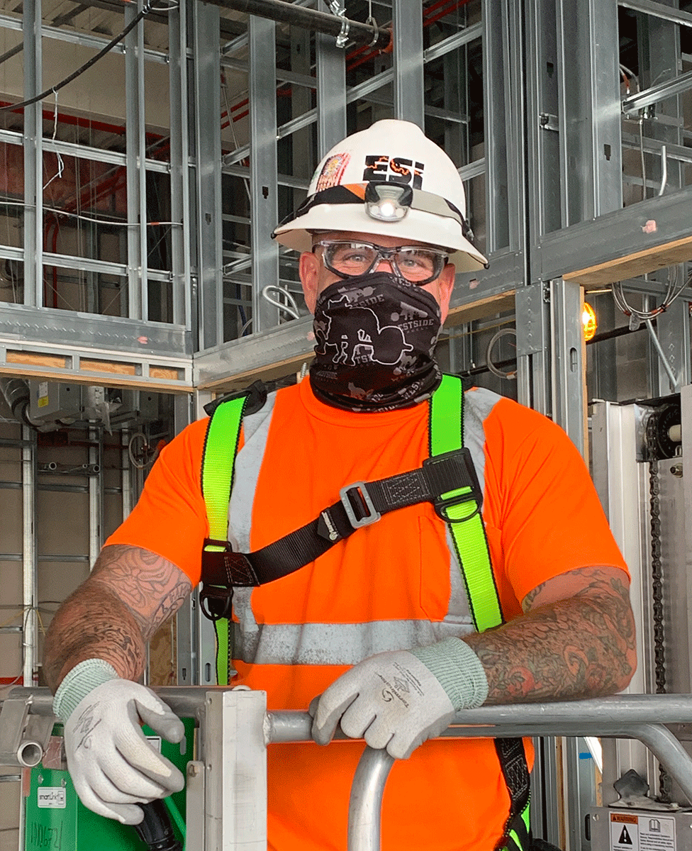 Electrician on lift
